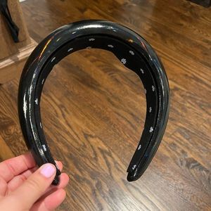 Lele Sadoughi black puffy headband. Slight shiny / metallic.